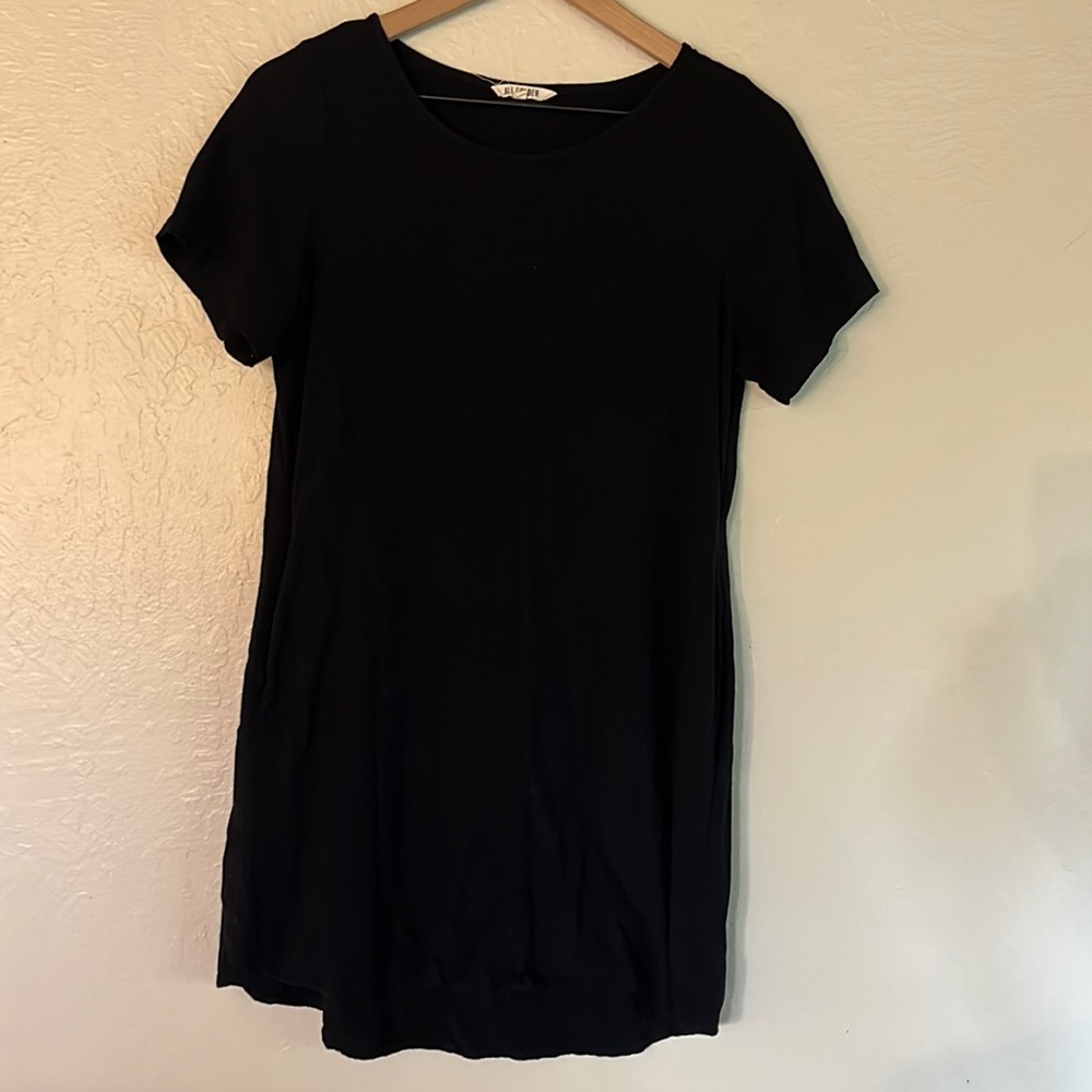 Ali Golden black dress with pockets